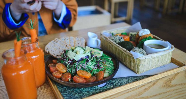 a table with brunch and drinks on it